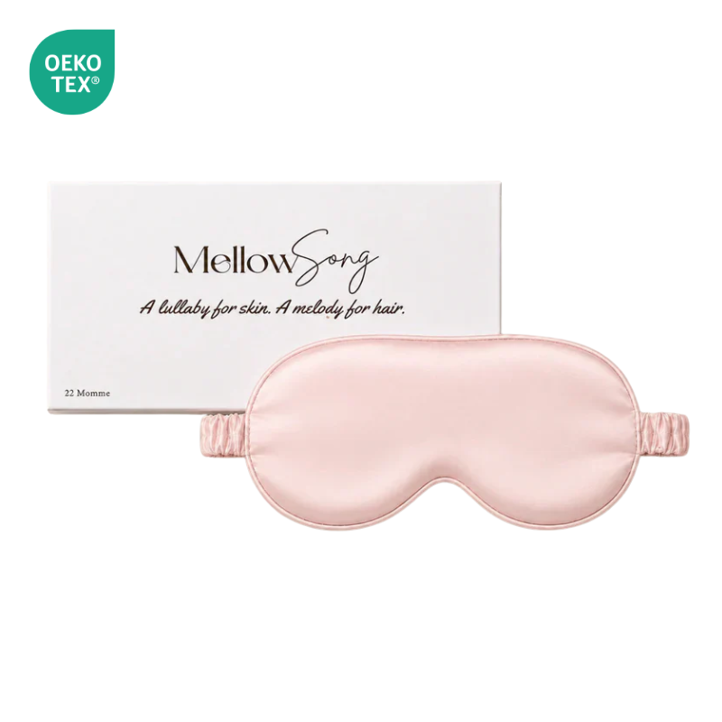 22 Momme Grade 6A mulberry silk sleep mask in blush pink, designed for comfortable light blocking and restful sleep.