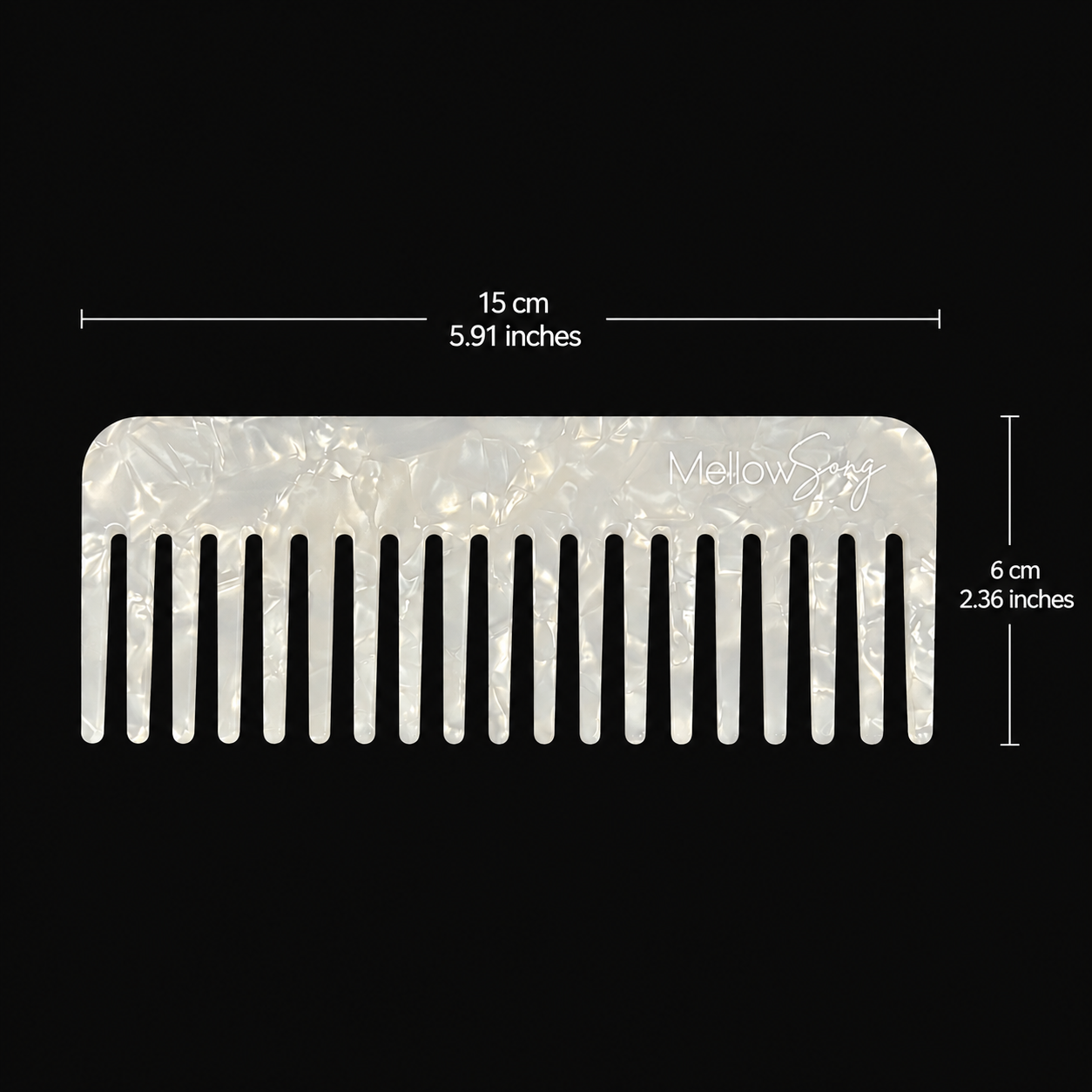 White comb with measurements(15cm by 6cm) on a black background
