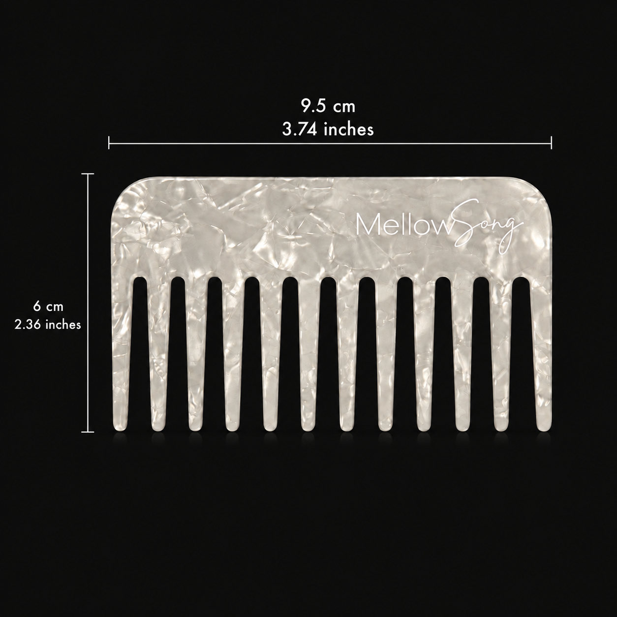 White comb with measurements(9.5cm by 6cm) on a black background